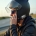The rider is wearing a s-11 Bluetooth intercom and driving on the highway, looking relaxed