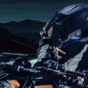 riding a motorcycle at night with a Bluetooth intercom