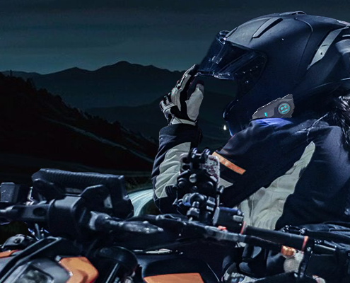 riding a motorcycle at night with a Bluetooth intercom
